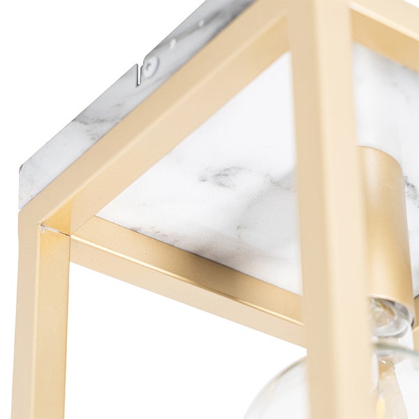 Detailaufnahme einer Deckenleuchte mit Marmorplatte und Metallrahmen