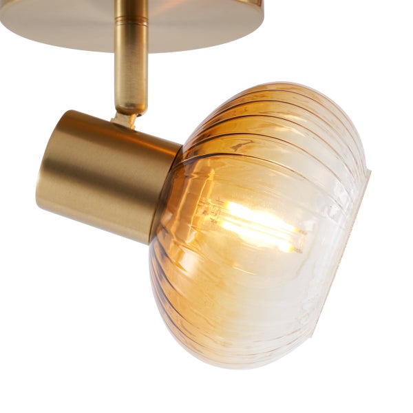 Deckenleuchte mit einem Spot aus transparentem Glas und Metall