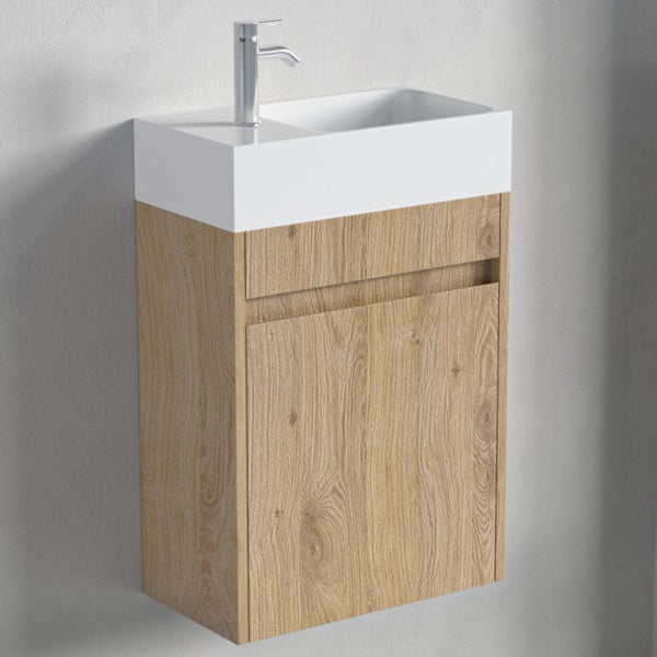 Wandhängender Waschtischunterschrank mit Holzoptik Front und integriertem Waschbecken inklusive Armatur für das Badezimmer.