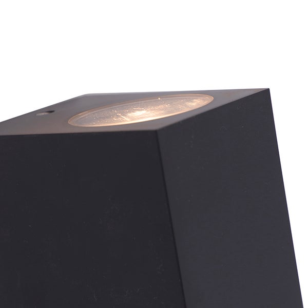 Moderne Außenleuchte aus Metall in Schwarz mit integriertem LED-Leuchtmittel und runder Lichtaustrittsfläche oben.