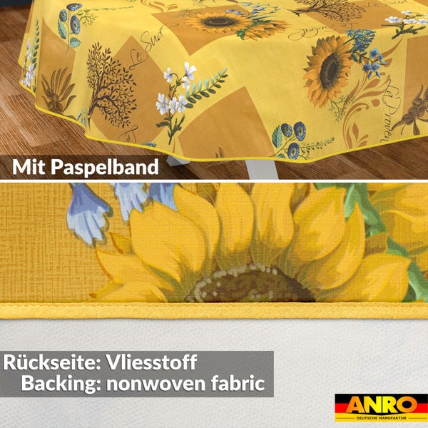 Tischdecke mit Sonnenblumenmotiv, Paspelband und Vliesstoff-Rückseite. ANRO Logo.