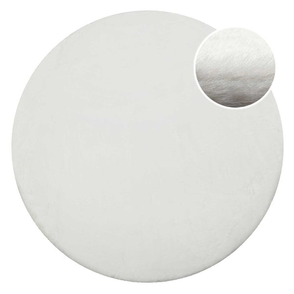 Runder weißer Plüschteppich mit weicher Oberflächenstruktur.