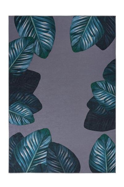Rechteckiger Teppich mit botanischem Muster aus großen Blättern am Rand, flachgewebt.