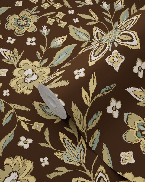 Vliestapete mit floralem Muster in Ikat-Optik, zeigt Blüten und Blätter auf dunklem Hintergrund.