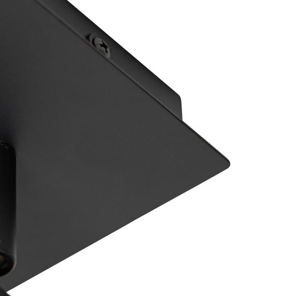 Detailaufnahme einer schwarzen Deckenleuchte mit Schraube