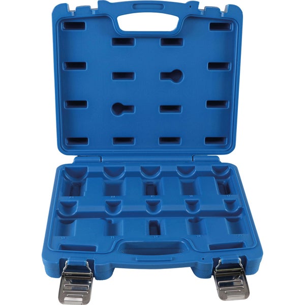 Blauer Werkzeugkoffer aus Kunststoff, geöffnet und leer, mit vorgeformten Fächern und Metallverschlüssen.