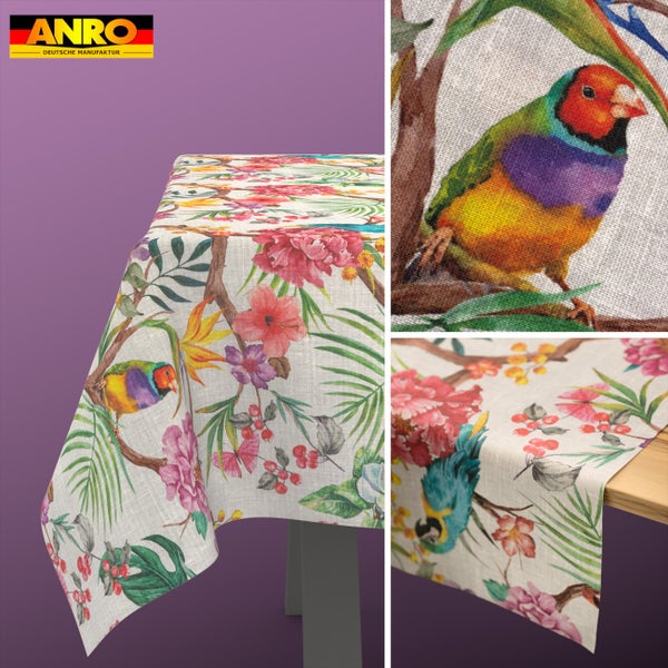ANRO Logo. Tischdecke und Läufer mit tropischem Muster aus Vögeln, Hibiskusblüten und Palmblättern auf strukturiertem Stoff.