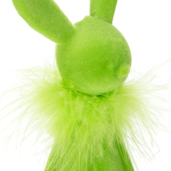 Dekorative grüne Hasenfigur mit Federn