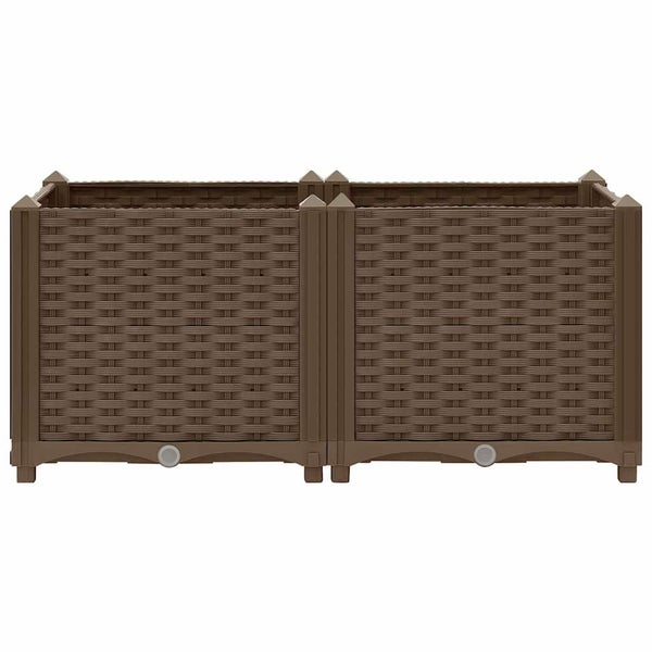 Hochbeet aus Kunststoff in Rattan-Optik mit zwei Kammern und Bewässerungssystem.