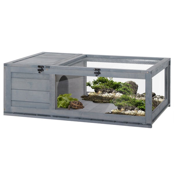 Holzterrarium mit Schildkröte, Pflanzen und Steinen