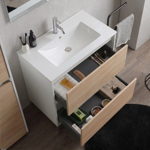 Moderner Waschplatz mit weißem Waschbecken, verchromter Armatur und zwei geöffneten Auszügen in heller Eichenoptik im Badezimmer.