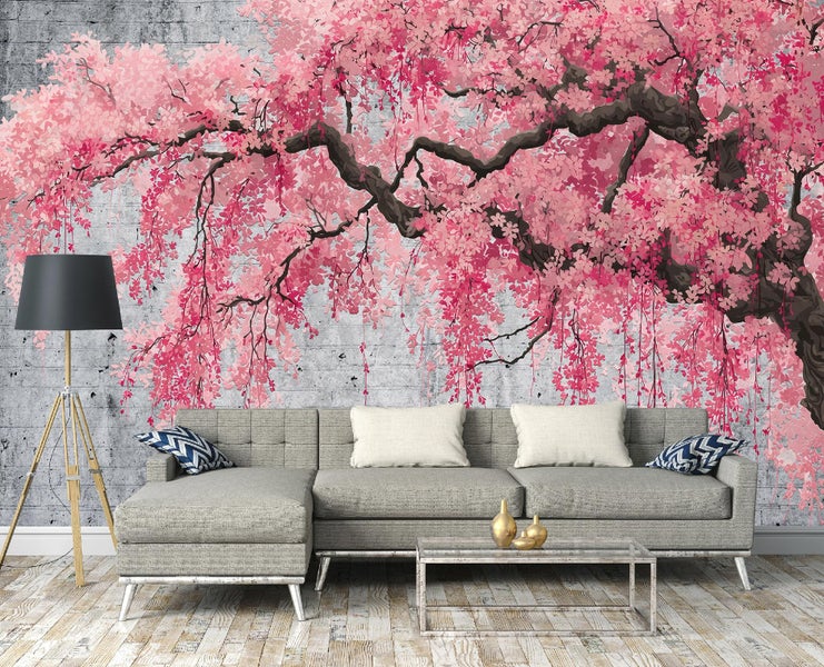 Wohnzimmer mit grauer Couch und Fototapete mit Kirschblütenmotiv