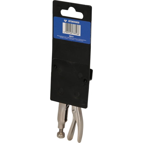 Gripzange auf einer schwarzen Verpackung