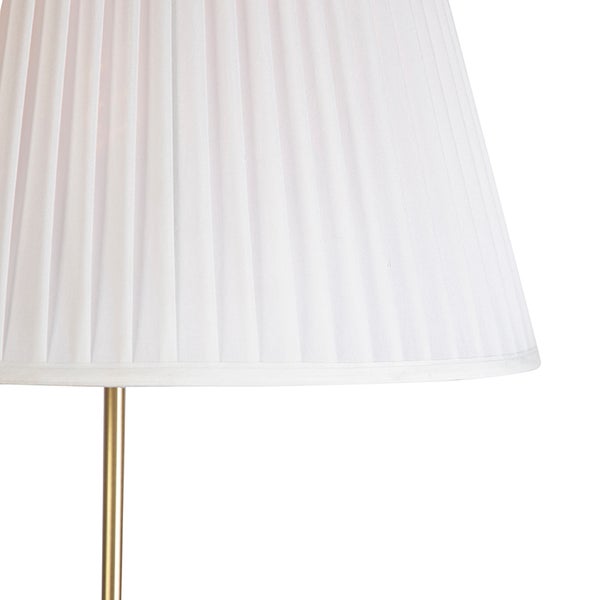 Detail einer Stehlampe mit weißem, plissiertem Lampenschirm