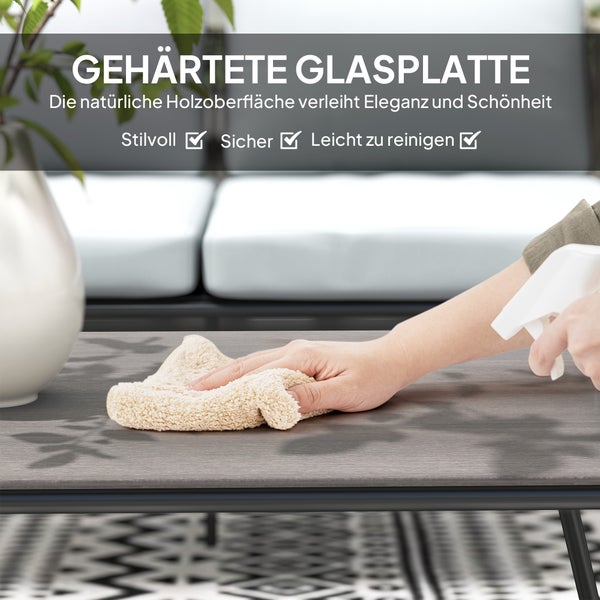 Reinigung einer Tischplatte mit gehärtetem Glas und Holzoberfläche