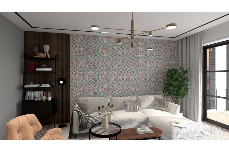 Wohnzimmer mit Sofa, Bücherregal und dekorativer Wand