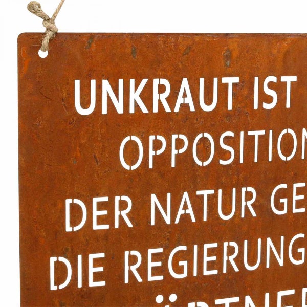 Dekoratives Schild mit dem Spruch Unkraut ist die Opposition der Natur gegen die Regierung