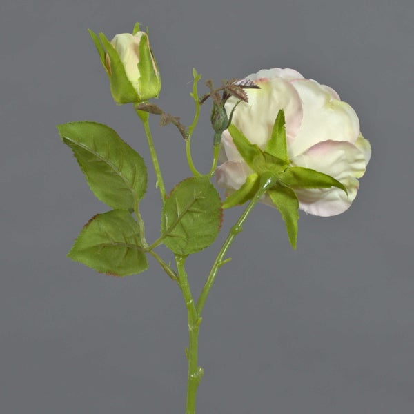 Künstliche Rose aus Textilmaterial mit hellrosa und cremefarbenen Blütenblättern.
