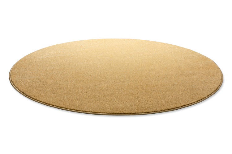 Runder Teppich in Beige mit geketteltem Rand.