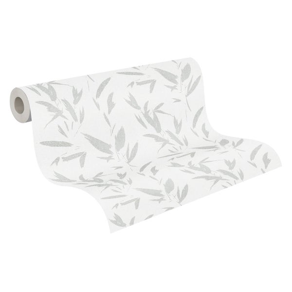 Bund frische Petersilie neben einem Topf auf einem karierten Tuch