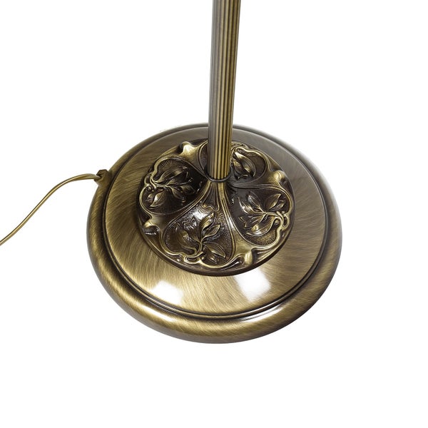 Detailaufnahme des Sockels einer Stehlampe mit Blattornamenten.