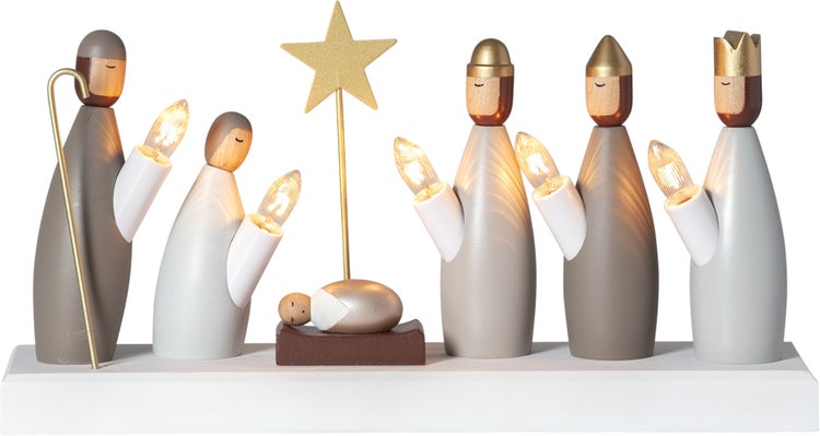 Weihnachtskrippe mit hölzernen Figuren und Beleuchtung