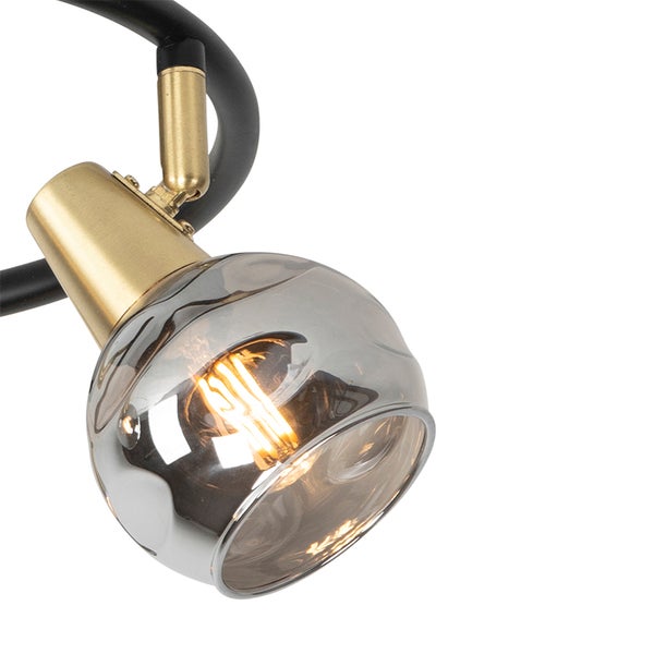 Nahaufnahme einer Deckenleuchte mit Glasschirm