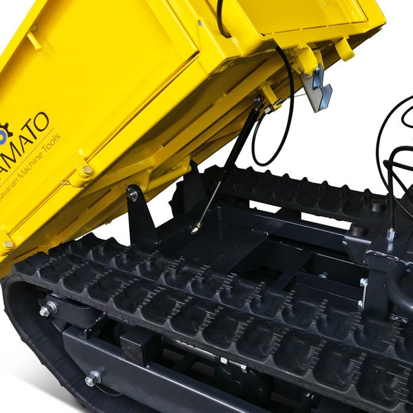 Gelber Dumper mit Raupenfahrwerk, Detailansicht