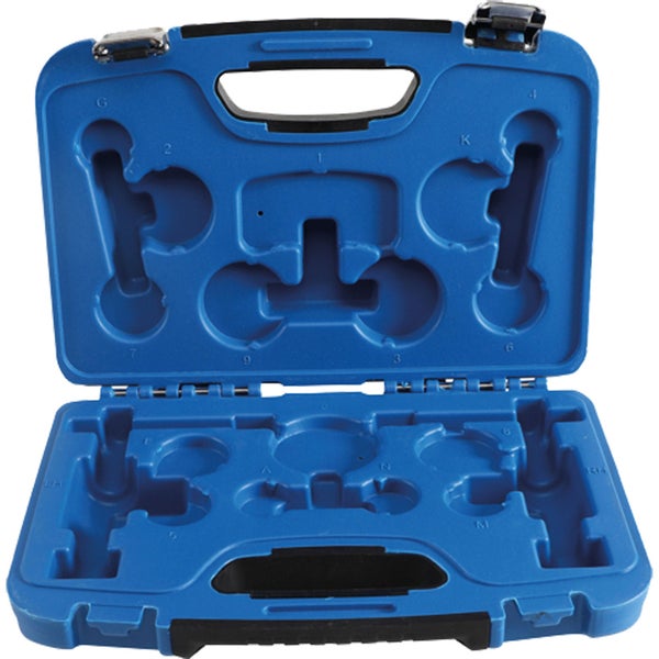 Flexibler Absaugschlauch mit grün-schwarzem Gewebemantel und schwarzen Anschlussstücken.