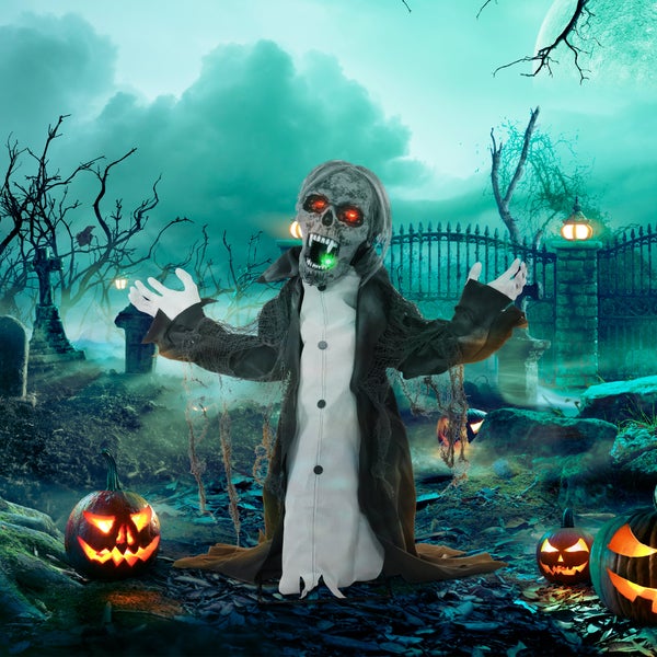 Halloween-Szene mit Friedhof, Kürbissen und animiertem Zombie
