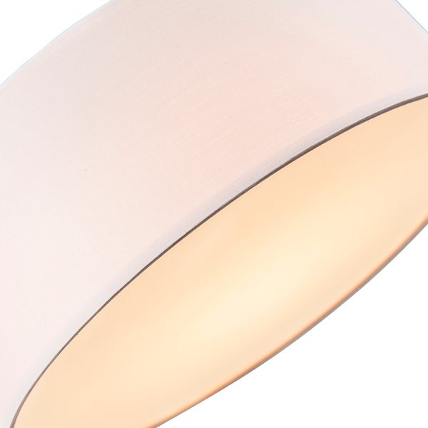 Nahaufnahme eines Textil-Lampenschirms mit goldfarbener Innenbeschichtung.