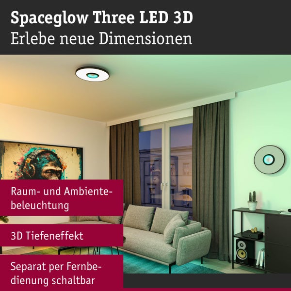 Modernes Wohnzimmer mit Spaceglow Three LED 3D Decken- und Wandleuchte, Raum- und Ambientebeleuchtung mit Tiefeneffekt, steuerbar per Fernbedienung.