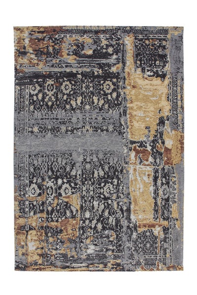 Rechteckiger Teppich mit abstraktem Patchwork-Design und orientalischen Mustern im Vintage-Look.