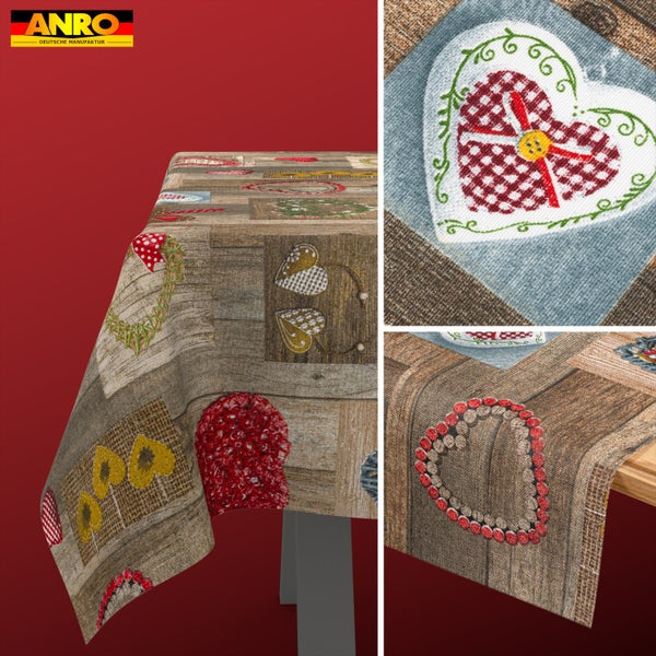 Tischdecke mit rustikalem Holz-Design und verschiedenen Herz-Motiven. ANRO Logo.