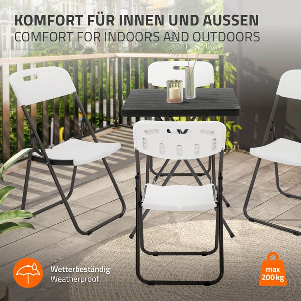 Gartenset mit einem Tisch und vier Klappstühlen für drinnen und draußen