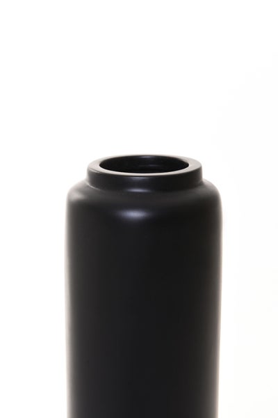 Moderne schwarze Vase in zylindrischer Form mit matter Oberfläche.