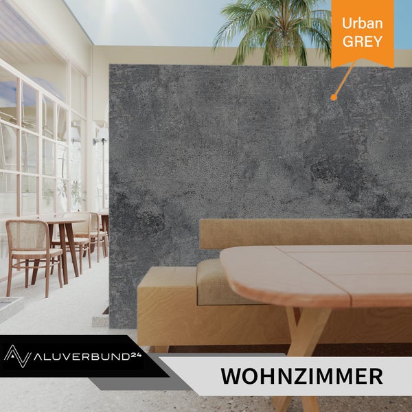 Wohnzimmergestaltung mit einer grauen Wand und einem Holztisch.