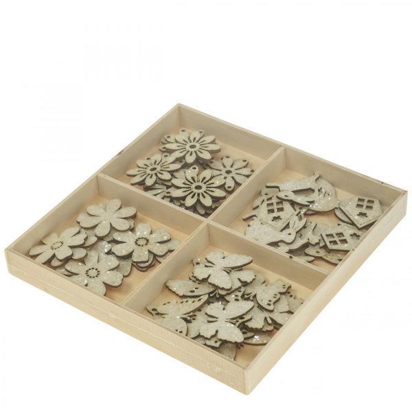 Holzstreuteile in einer Sortierbox mit Blumen, Schmetterlingen, Hasen und Häusern