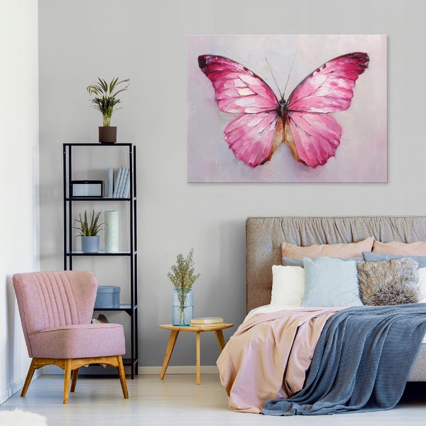 Schlafzimmer mit Bett, Sessel, Regal und Schmetterlingsbild