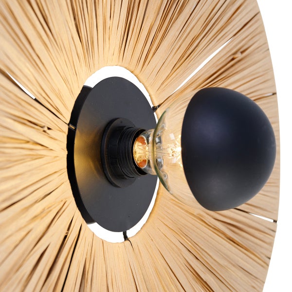 Wandleuchte aus Bast mit radialem Design, schwarzer Metallbasis und Leuchtmittel mit schwarzer Kappe.
