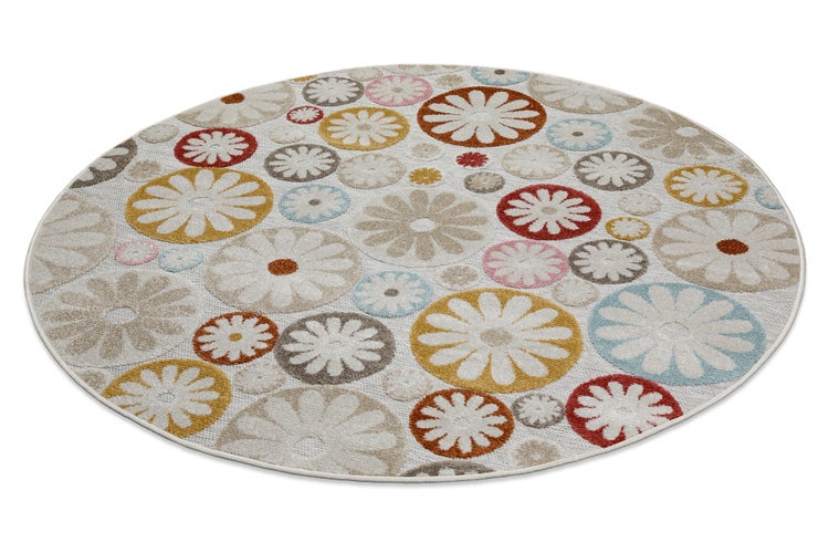 Runder Teppich mit buntem Blumenmuster bestehend aus kreisförmigen Blütenmotiven in verschiedenen Farben und Größen.