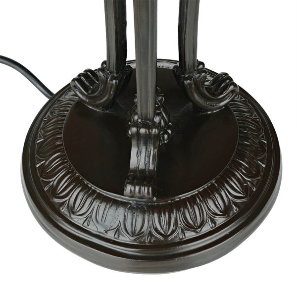 Detailaufnahme des Lampenfußes mit dekorativen Verzierungen