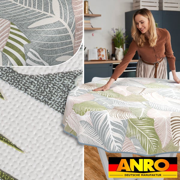 Frau drapiert eine runde Tischdecke mit Blättermuster auf einem Tisch, Ansicht der Tischdeckenoberfläche mit Noppen, Anro Logo