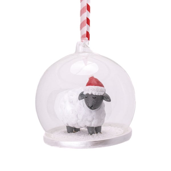 Weihnachtsbaumschmuck mit Schaf in einer Glaskugel