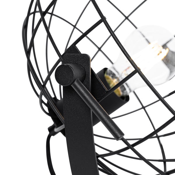 Detailansicht einer schwarzen Gitterlampe mit Glühbirne