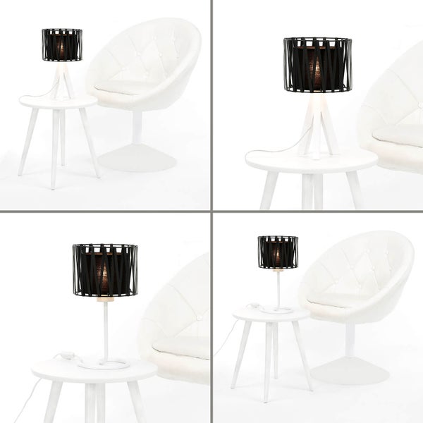 Dekorative Tischleuchte auf einem Beistelltisch neben einem Sessel