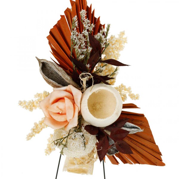 Dekoratives Gesteck mit Rose, Blüten und Blättern