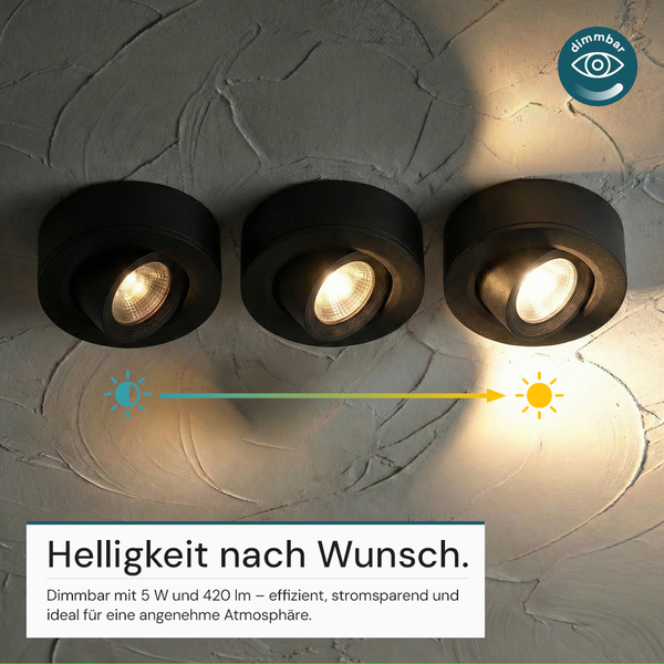 Drei dimmbare LED-Aufbaustrahler in Schwarz mit 5 Watt und 420 Lumen in verschiedenen Helligkeitsstufen.