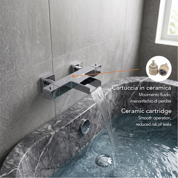 Wandmontierte Wannenarmatur mit Wasserfall-Auslauf über einer Marmor-Badewanne, inklusive Keramikkartusche für reibungslose Bedienung.