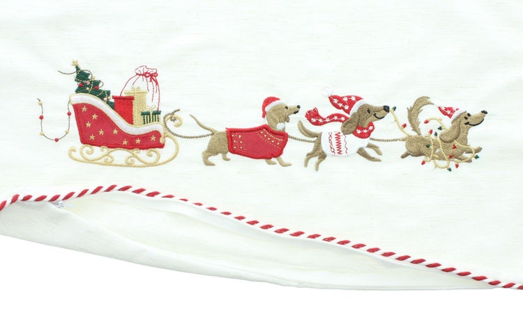 Weihnachtskissenbezug mit Dackel Stickerei die einen Schlitten ziehen